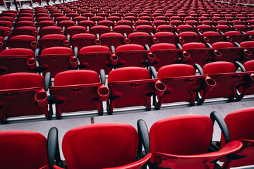 Naklejka premium Red Seats in a Sports Stadium