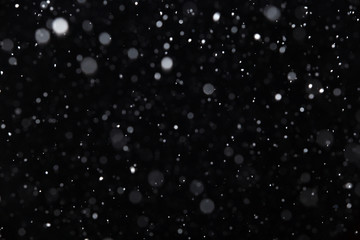 Fototapeta na wymiar snow on a black background