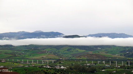 Fototapeta na wymiar Long cloud over Valley