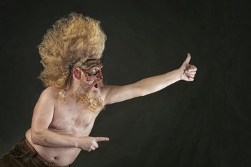 adult man with a beard and a high mohawk