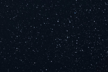 snow on a black background