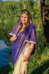Obraz na płótnie Canvas Beautiful european woman in sari