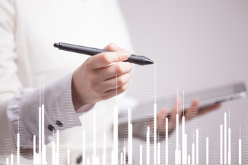 Finance data concept. Woman working with Analytics. Chart graph information on digital screen.