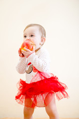 Little girl with an apple