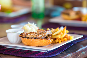 Closeup of delicious fresh burger with cheese and bacon