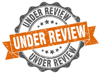 Obraz premium under review stamp. sign. seal