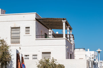 white plaster walls of mediterranean style buildings