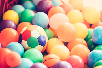 Colorful plastic balls in children park