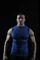 Fototapeta na wymiar bodybuilder handsome man with muscular body training in gym