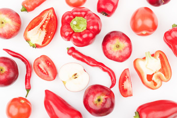 Set of red fruits and vegetables, light background