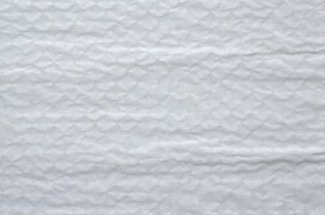 Wrinkled paper surface in white color suitable for background