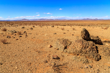 Beautiful Moroccan landscape, Sahara desert, stones against the sky