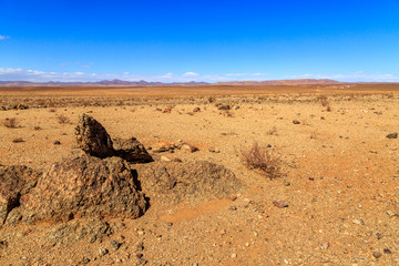 Fototapeta na wymiar Beautiful Moroccan landscape, Sahara desert, stones against the sky