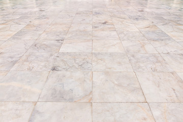 Real marble floor tile in perspective with beige abstract texture pattern of natural material i.e....
