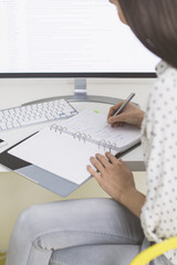 Unrecognizable Businesswoman Working