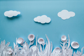 Paper art and origami concept of Flower meadow. White paper flower on blue background