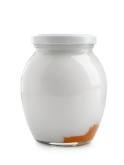 Glass jar with tasty yogurt and jam on white background