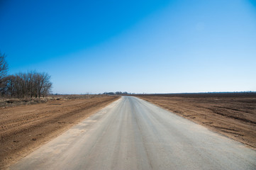 Fototapeta na wymiar Lonely road in rural area