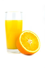 Fresh ripe orange and orange juice on a wooden background. Close up