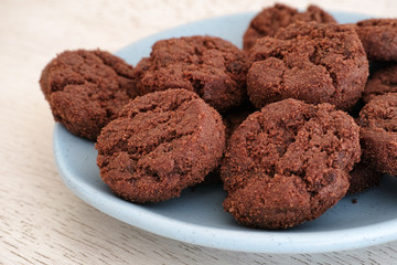 Gluten free cookies with chocolate chips on a blue plate