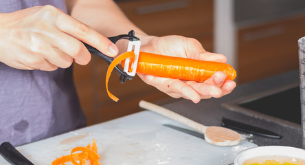 Cook peeling carrots with a ceramic knife