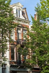 Naklejka premium Traditional old buildings in Amsterdam