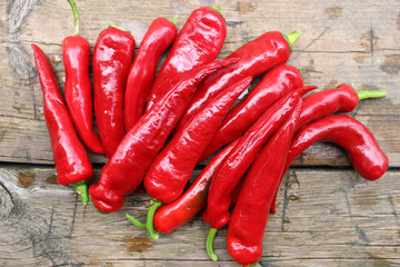 Chili pods on a wooden background
