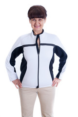 Fototapeta premium Happy pension age good looking woman in sport outfit against of white background