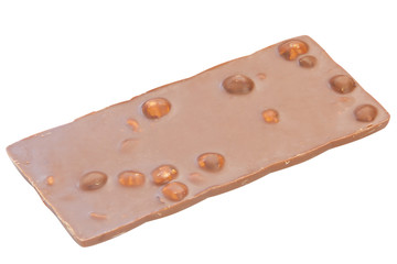 Delicious milk chocolate with hazelnuts on white background