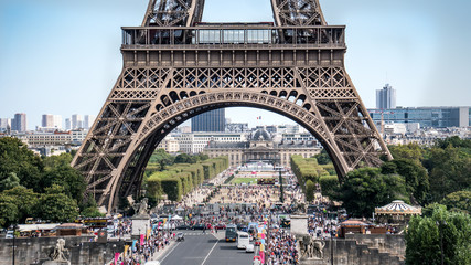Paris, France - September 10, 2016: The legs of Eiffel Tower with tourist crowd waiting in lines