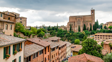 Siena, Italy - September 5, 2014: Scenery of Siena, a beautiful medieval town in Tuscany, with view of the Basilica of San Domenico