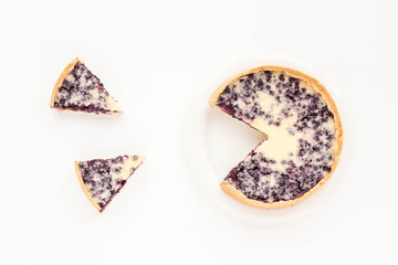 Dessert with berry pie on white background. Top view, flat lay. Summer dessert.