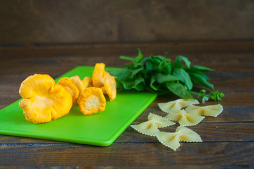 Delicious wild mushrooms chanterelle on table