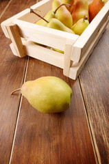 Wooden crate with pears