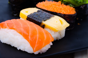 Traditional japanese food. Raw salmon sushi.