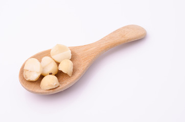 macadamia nuts in a spoon
