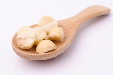macadamia nuts in a spoon