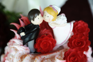 Close up of cute and playful wedding topper