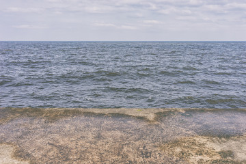 Pier in the sea and the sky