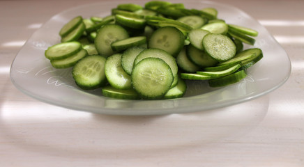 Fresh green cucumbers prepared for vegetable salad