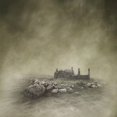 Abandoned, derelict croft in a bleak, misty moorland landscape captured using long exposure, bokeh and other effects with some areas blurred to create a surreal and dreamlike effect. - obrazy, fototapety, plakaty