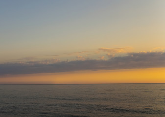 Fototapeta na wymiar twilight panorama of sea sunset or sunrise a bright sky on the horizon ship