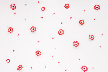 Card with spring flowers. Pink flowers on white background. Flat lay.