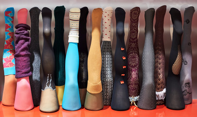 women's mannequins legs in warm colored pantyhose