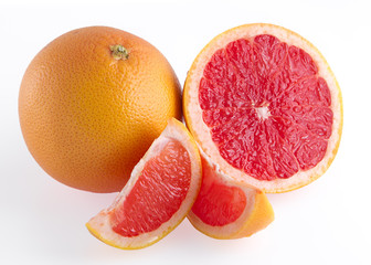 Pieces of pink grapefruit over white background