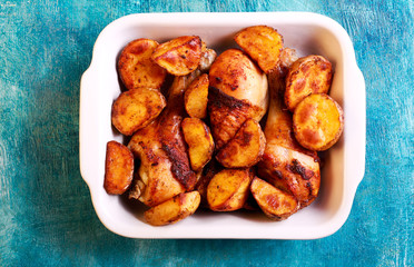 Roasted chicken drumsticks and potatoes