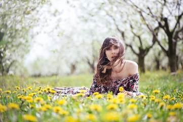 beautiful woman in dress in the gardens