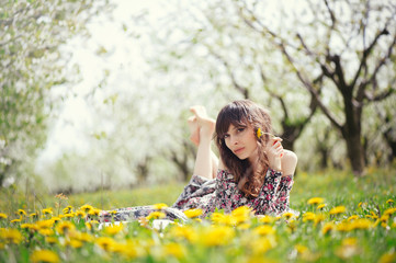 beautiful woman in dress in the gardens