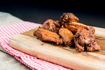 delicious fried chicken wings with sauce