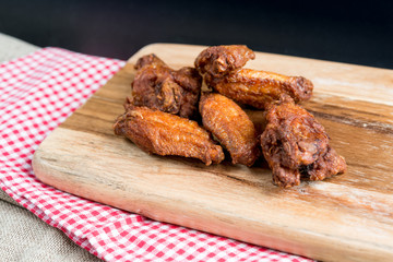 delicious fried chicken wings with sauce
